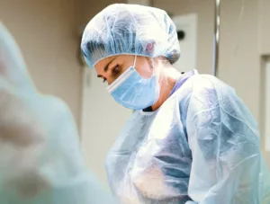 female surgeon doing surgery