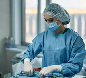 female surgeon prepping for surgery 