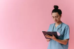 female healthcare worker with clipboard