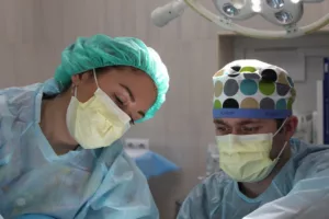 doctors doing surgery with masks