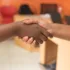 Two practices shaking hands for a merger