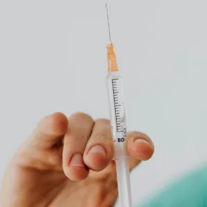 COVID-19 vaccine held by nurse